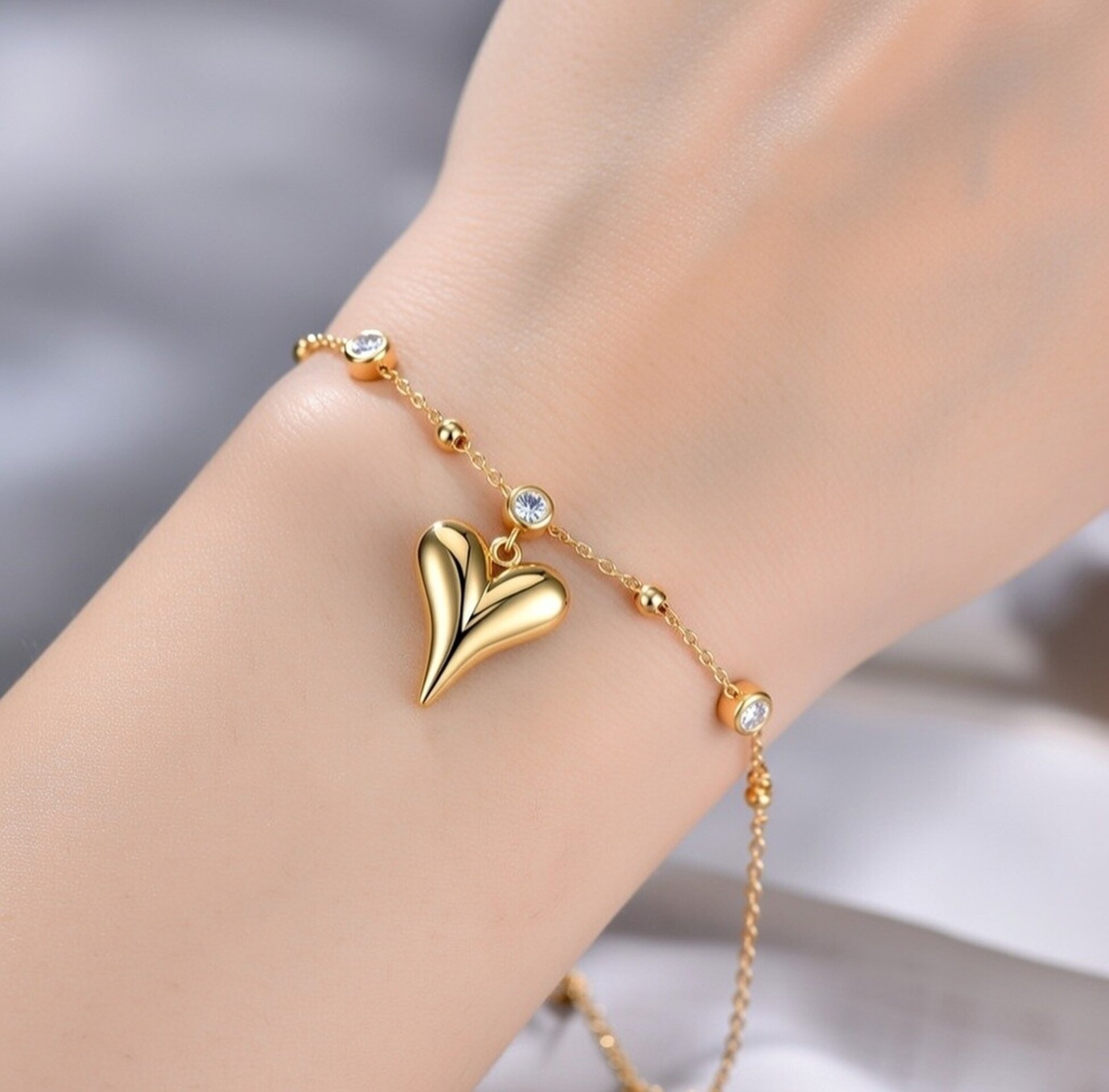 Pulsera tobilleras de acero dorado con corazón y circonitas – Joyería elegante - 3