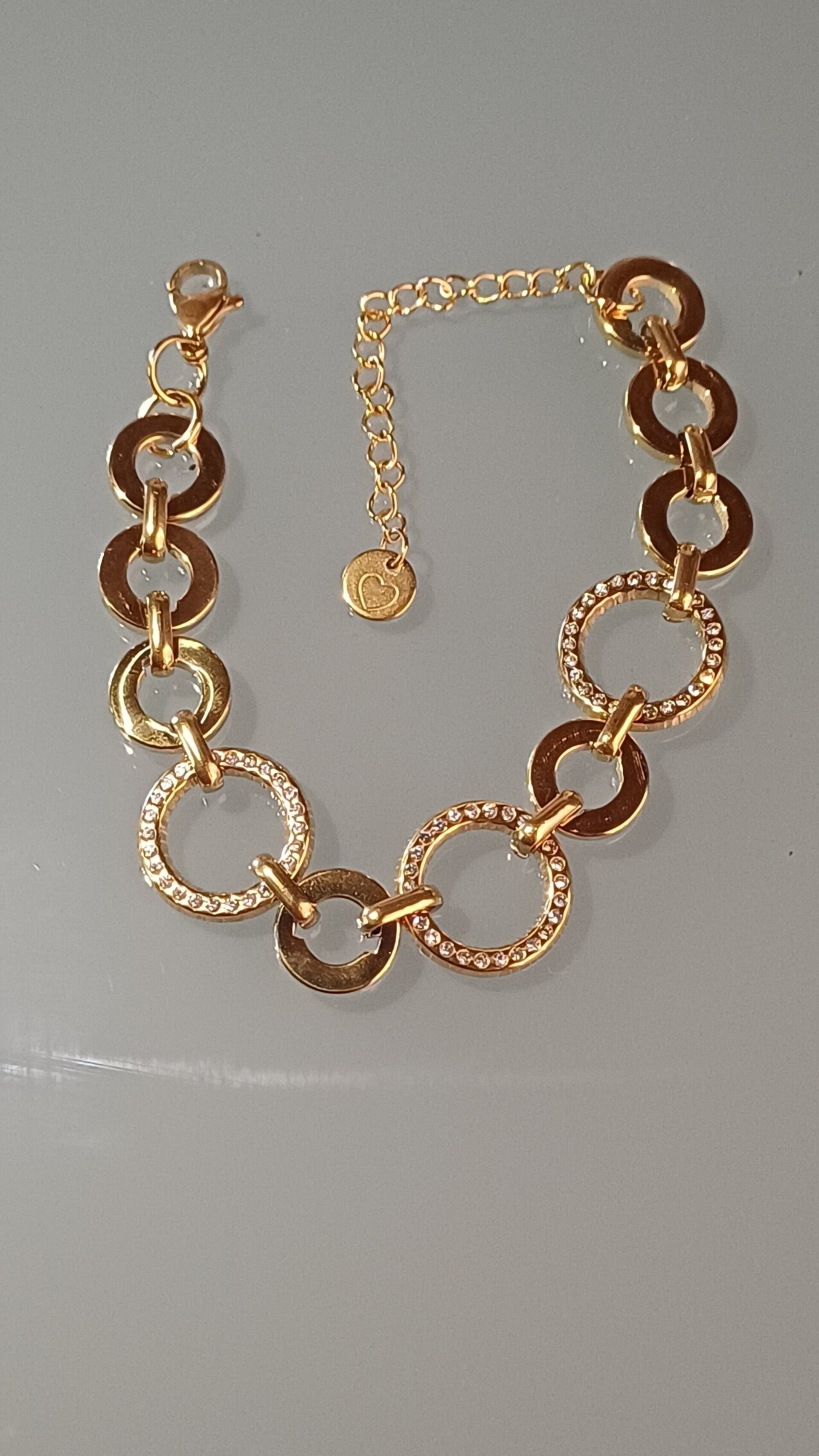Pulsera Anaís de acero dorado con círculos brillantes - 6